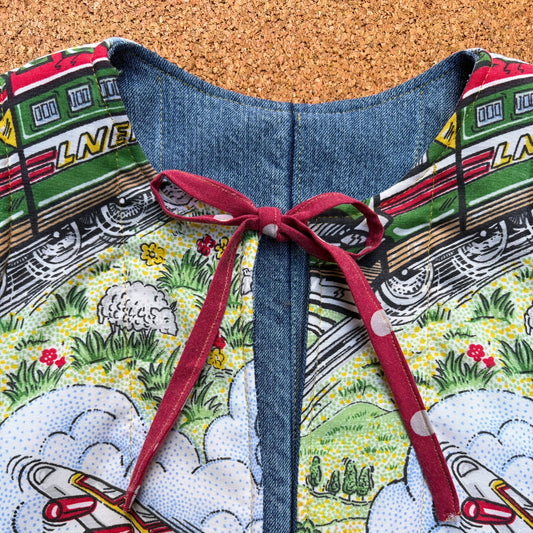 Planes, Trains and Fire-Engines Quilted Reversible Waistcoat